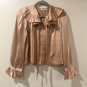 Silk blouse with romantic details, silk covered buttons, and so soft. NWT.